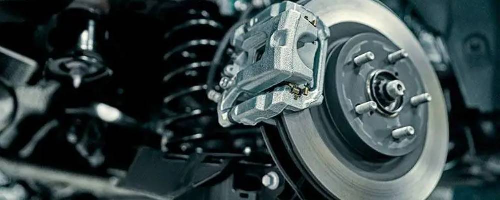 A close up of a Kia vehicle's brake system