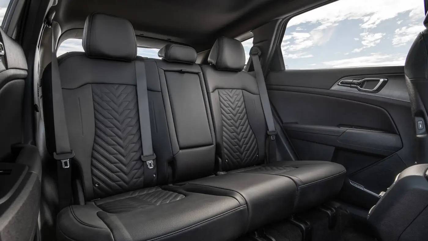 The black back seats in a 2026 Kia Sportage. 2026 Kia Sportage vs 2025 Kia Sorento at Lally Kia in Chatham, ON